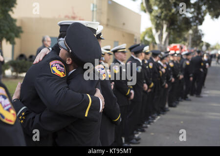 San Diego, California, USA. 24th Dec, 2017. Thousands of firefighters and family members gather to celebrate the life of CAL FIRE Engineer Cory Iverson who dead in the line of duty battling the Thomas Fire at Rock Church in San Diego on December 23, 2017 Credit: Kevin Warn/ZUMA Wire/Alamy Live News Stock Photo