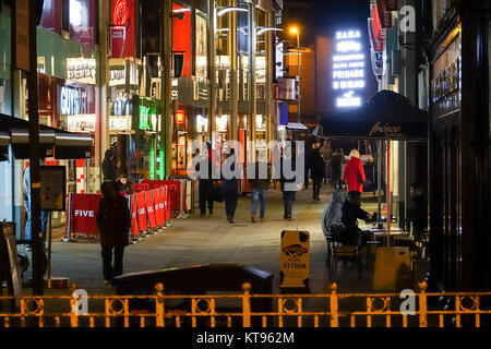 High Street, Guildford. 23rd December 2017. People enjoying late night shopping 48 hours before Christmas. Guildford in Surrey. Credit: james jagger/Alamy Live News Stock Photo