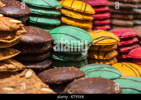 Stacks of Nuremberg gingerbread in different colors at the Christmas market close up Stock Photo