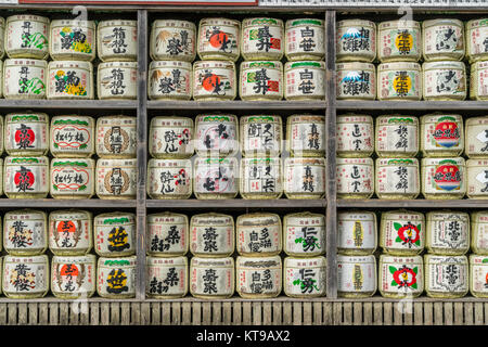 Kamakura, Japan - 22 November 2017 : Sake barrels (Sadaraku) at Tsurugaoka Hachimangu Shinto shrine. Casks of sake given as offering to the shrine and Stock Photo