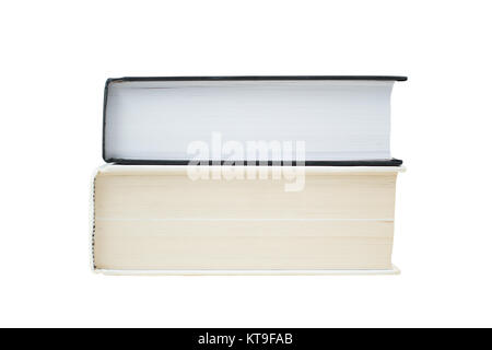 Two hardcover books on each other isolated on white background. White and black book. Path saved Stock Photo