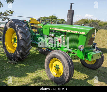 Restored vintage John Deere 2020 tractor. Stock Photo