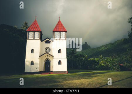 Rainbow on Haapiti church in Moorea island, landscape Stock Photo