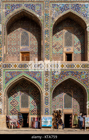 Colourful Souvenir Shops Inside The Sher Dor Madrassa, The Registan, Samarkand, Uzbekistan Stock Photo