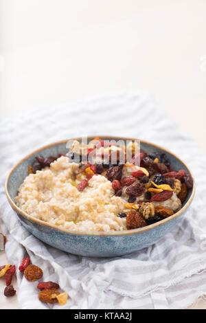 Steel Cut Oats Served with Dried Fruit and Berries Stock Photo