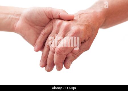 Person holding another's hand, close up. Stock Photo