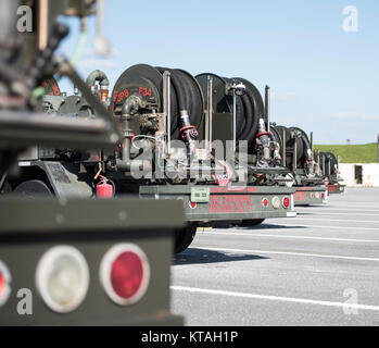Refueling trucks sit parked, Dec. 21, 2017, at Kadena Air Base, Japan.  The refueling maintenance shop is an outlying vehicle maintenance shop of the 18th Wing Logistics Readiness Squadron at Kadena AB that specializes in maintaining and repairing refuel trucks. (U.S. Air Force Stock Photo