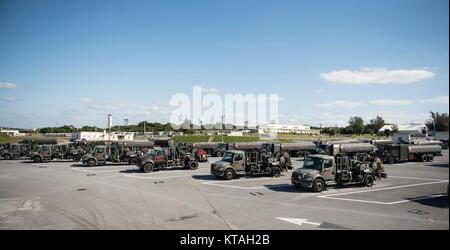 Refueling trucks sit parked, Dec. 21, 2017, at Kadena Air Base, Japan.  The refueling maintenance shop is an outlying vehicle maintenance shop of the 18th Logistics Readiness Squadron at Kadena AB that specializes in maintaining and repairing refuel trucks. (U.S. Air Force Stock Photo