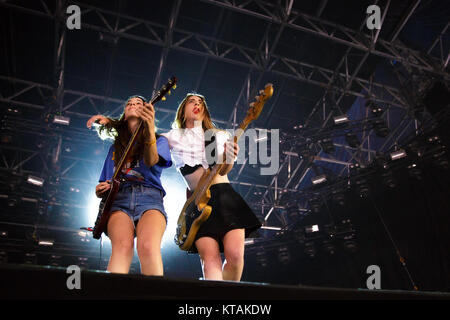 Danielle Haim and Este Haim of HAIM performs during day 3 of the 2013 ...