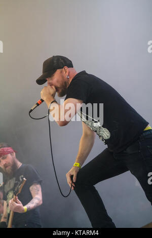The Swedish grindcore band Nasum performs a live concert at the Danish music festival Roskilde Festival 2012. Here vocalist Keijo Niinimaa is seen live on stage. Denmark, 08/07 2012. Stock Photo