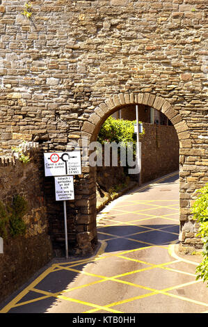Narrow tunnel on a small road in the centre of the medevil Conwy town, North Wales Stock Photo