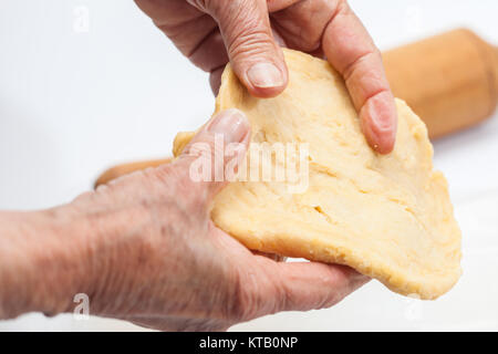 Ravioli Preparation : Stretching pasta dough Stock Photo