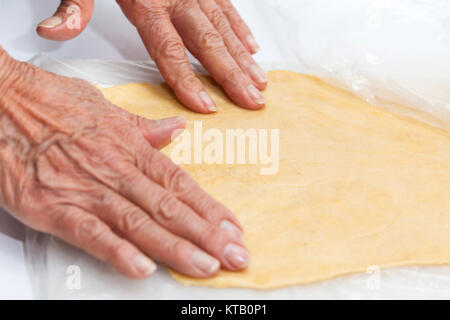 Ravioli Preparation : Stretching pasta dough Stock Photo