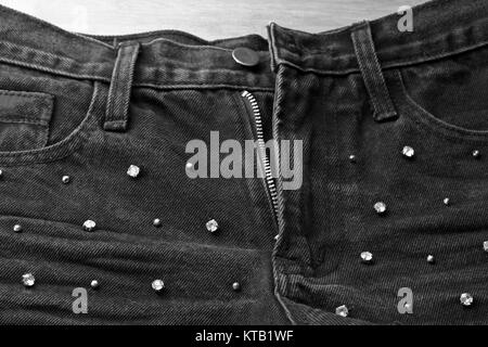 jeans lady shots fashion diamond detail closeup black white Stock Photo