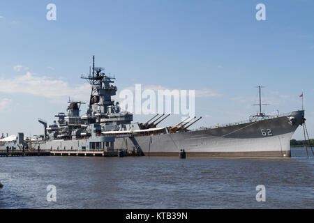 The Battleship New Jersey, moored on the Delaware River, Camden, NJ, United States.   USS New Jersey (BB-62) is an Iowa-class battleship. Stock Photo
