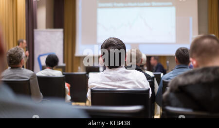 Male speeker having talk at public event. Stock Photo