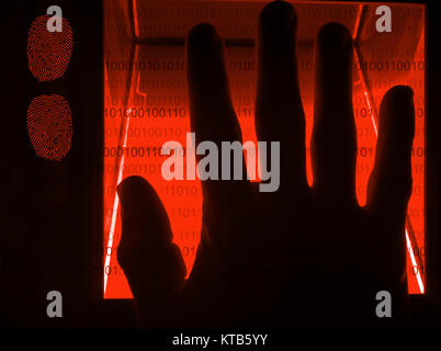 red cybersecurity digital fingerprint scanning on a green screen Stock Photo
