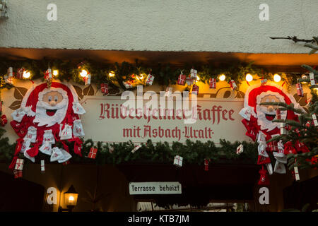 A sign adverts RŸdesheim coffee. The 24th RŸdesheim Christmas Market of Nations in RŸdesheim, Germany is held in the old town of RŸdesheim. Stock Photo