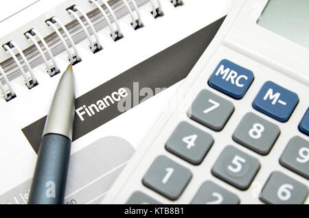 Finance word printed on book Stock Photo