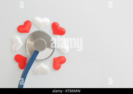 Stethoscope and fabric hearts in flower shape Stock Photo