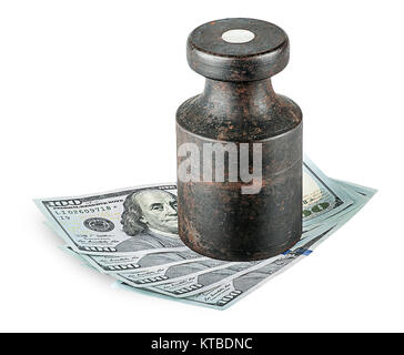 Banknotes clamped old rusty weights Stock Photo