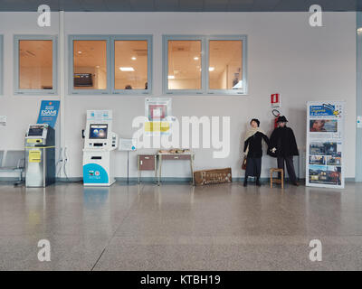 Biella, Italia - December 15, 2017: Counters reports in the atrium of the Biella hospital with dummies and festive decorations. Modern architecture an Stock Photo