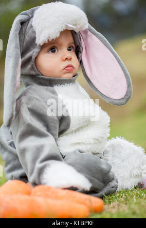 Little baby girl wearing a rabbit costume Stock Photo Alamy