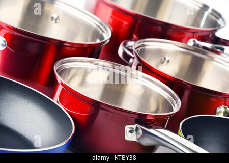 Composition with a set of steel pots Stock Photo