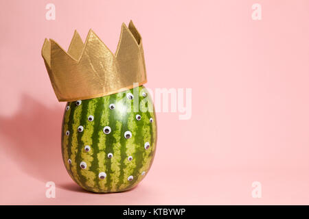 Freak watermelon wearing a crown Stock Photo