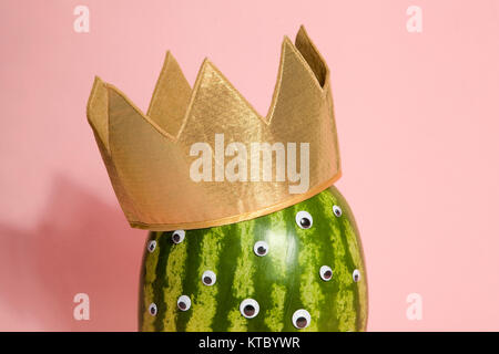 Freak watermelon wearing a crown Stock Photo