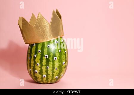 Freak watermelon wearing a crown Stock Photo