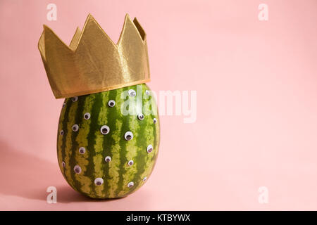 Freak watermelon wearing a crown Stock Photo