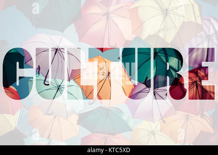Word CULTURE over colorful umbrellas. Stock Photo