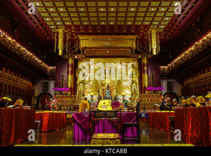 Singapore - Jun 12, 2017. Inside of Buddha Tooth Relic Temple in Chinatown, Singapore. Buddhism first appeared around the Singapore Straits during the Stock Photo