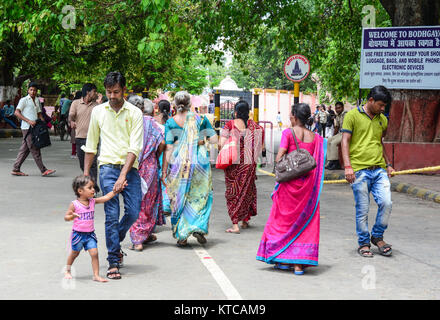 Bodhgaya, India - Jul 9, 2015. Many Indian women on street wearing traditional sari in Bodhgaya, India. Saris are wrapped around the body, 4 to 8 metr Stock Photo