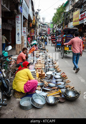 Delhi, India - Jul 26, 2015. Vendors on street at the traditional market in Old Delhi, India. Stock Photo