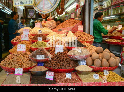 Delhi, India - Jul 26, 2015. People selling spices at traditional market in Delhi, India. Stock Photo