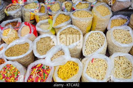 Delhi, India - Jul 26, 2015. Dried foods for sale at local market in Old Delhi, India. Stock Photo