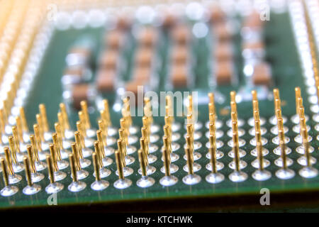 The micro elements of computer central processor unit, CPU contact pins close up. Stock Photo