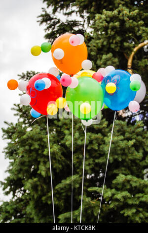 Multicolored balloons against the background of a cloudy sky Stock Photo