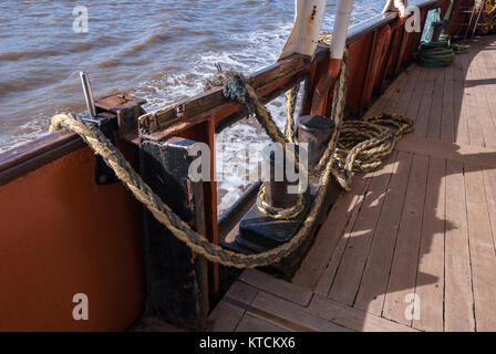 Ropes and mooring posts onboard a ferry. Stock Photo