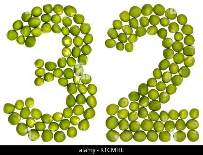 Arabic numeral 32, thirty two, from green peas, isolated on white background Stock Photo