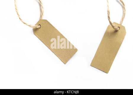 Brown price name tags with rope isolated on white background Stock Photo
