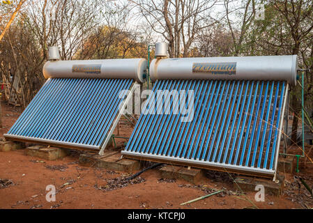 Solar powered water heater provides hot water to guest rooms at an eco-lodge Olympe du Bemaraha near Tsingy National Park. Madagascar, Africa. Stock Photo