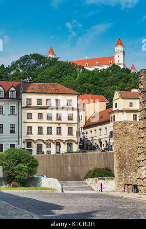 View from the Rudnay Street (Rudnayovo namestie) to Bratislava castle. Bratislava castle is located in Bratislava, the capital of Slovakia in Europe Stock Photo