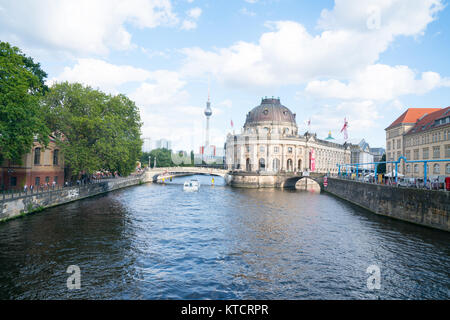 BERLIN, GERMANY - AUGUST 28 2017; Baroque architectural exterior of Bode Museum from northern end of Museum Island surrounded by River Spree with Fern Stock Photo