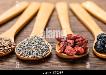 Superfoods In Wooden Spoons Stock Photo