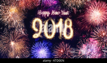 Happy new year 2018 colorful fireworks festive celebration countdown at dark night sky. holiday greeting card seasonal concept Stock Photo