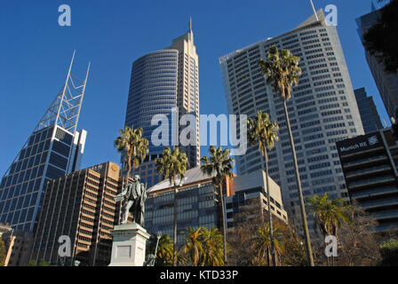 Sydney, Australia - July 7, 2017: Captain Arthur Phillip monument in Royal Botanical Gardens, Deutsche Bank Place building, and Chifley Tower Stock Photo