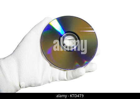 Hand in a white glove holding the compact disc CD Stock Photo